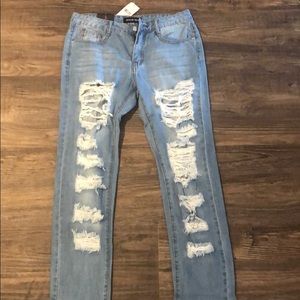 High waisted distressed denim jeans